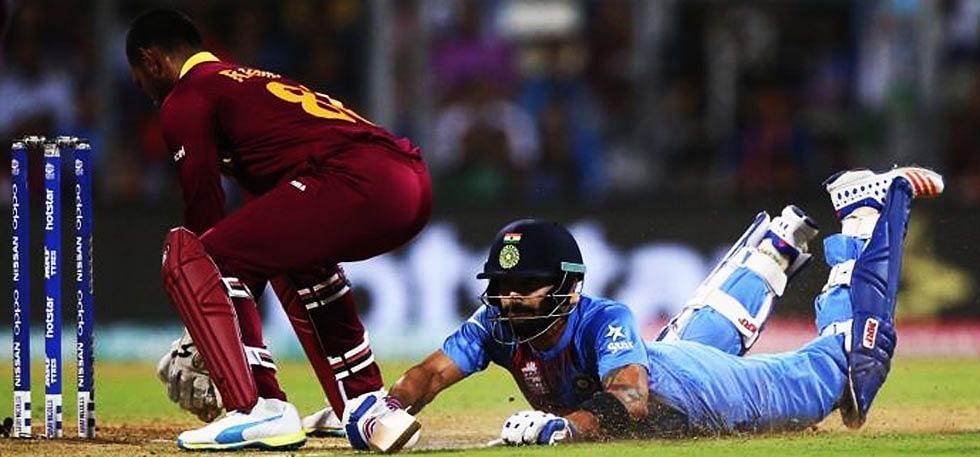 Virat Kohli (right) waged a lone battle for India in the semi-final.